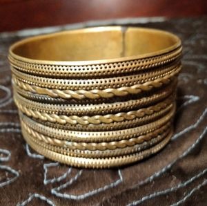 Ladies bracelet, thick solid copper, intricate designed.